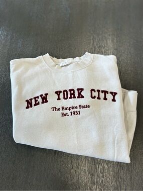 Reflex Cream Crewneck Sweatshirt with Red 'New York City' Script